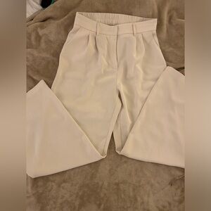 Loose, light weight beige trousers